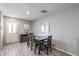 Dining area with a dark gray table and four chairs at 3440 W Krall St, Phoenix, AZ 85017