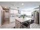 Updated kitchen with white cabinets and quartz countertops at 3440 W Krall St, Phoenix, AZ 85017