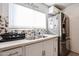 Kitchen with stainless steel appliances and white cabinets at 3440 W Krall St, Phoenix, AZ 85017