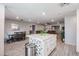 Modern kitchen with white cabinets and a center island at 3440 W Krall St, Phoenix, AZ 85017