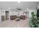 Spacious living room with wood-look floors and comfortable seating at 3440 W Krall St, Phoenix, AZ 85017