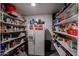 Well-stocked pantry with ample shelving at 3440 W Krall St, Phoenix, AZ 85017