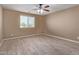 Bedroom with ceiling fan and wood-look floors at 39979 W Robbins Dr, Maricopa, AZ 85138