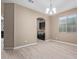 Dining room with wood-look floors and built-in cabinets at 39979 W Robbins Dr, Maricopa, AZ 85138