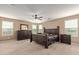 Main bedroom with king bed and ample closet space at 39979 W Robbins Dr, Maricopa, AZ 85138