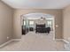 View of main bedroom through arched doorway at 39979 W Robbins Dr, Maricopa, AZ 85138