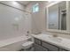 Clean bathroom, featuring a shower/tub combo and gray vanity at 4137 E Ronald St, Gilbert, AZ 85295