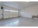 Spacious garage with epoxy flooring and an automatic garage door at 4137 E Ronald St, Gilbert, AZ 85295