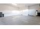 Clean and well-lit garage, offering extra storage space at 4137 E Ronald St, Gilbert, AZ 85295