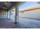 Covered patio with brick pavers and ceiling fan at 4137 E Ronald St, Gilbert, AZ 85295