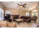 Spacious living room featuring a fireplace and ample seating at 4407 E Villa Theresa Dr, Phoenix, AZ 85032