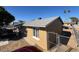 Side view of tan house, fenced yard at 4854 W Berkeley Rd, Phoenix, AZ 85035