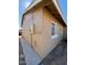 Tan house exterior with white windows and walkway at 4854 W Berkeley Rd, Phoenix, AZ 85035