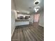Open concept kitchen with a breakfast bar, stainless appliances, and ample storage space at 4854 W Berkeley Rd, Phoenix, AZ 85035