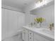 Elegant bathroom with double vanity and updated fixtures at 5429 W Kerry Ln, Glendale, AZ 85308