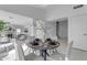 Modern dining room with dark wood table and gray chairs at 5429 W Kerry Ln, Glendale, AZ 85308