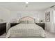 Main bedroom with king-size bed, tufted headboard, and two nightstands at 5629 S Veneto --, Mesa, AZ 85212