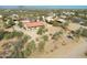 Aerial view showing a single story home with surrounding desert landscape at 5820 E Morning Vista Ln, Cave Creek, AZ 85331