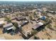 Aerial view of property showing house, outbuildings, and desert landscape at 5820 E Morning Vista Ln, Cave Creek, AZ 85331