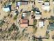 Aerial view of property showing house and surrounding buildings in desert setting at 5820 E Morning Vista Ln, Cave Creek, AZ 85331