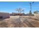 Large backyard with a windmill and shed at 5820 E Morning Vista Ln, Cave Creek, AZ 85331