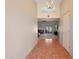 Bright entryway with tile floors and chandelier at 5820 E Morning Vista Ln, Cave Creek, AZ 85331