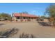 One-story home with red tile roof and landscaping at 5820 E Morning Vista Ln, Cave Creek, AZ 85331