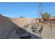 Relaxing firepit area with seating for outdoor gatherings at 5820 E Morning Vista Ln, Cave Creek, AZ 85331