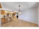 Open kitchen with breakfast bar seating and seamlessly connects to the dining area at 5820 E Morning Vista Ln, Cave Creek, AZ 85331