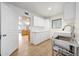 Convenient laundry room with stainless steel utility sink, and plenty of cabinet space at 5820 E Morning Vista Ln, Cave Creek, AZ 85331