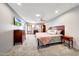 Spacious main bedroom with soft carpet, ceiling fan, and large closet at 5820 E Morning Vista Ln, Cave Creek, AZ 85331