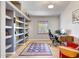 Bright office space with built-in shelving, natural light, and a comfortable workspace at 5820 E Morning Vista Ln, Cave Creek, AZ 85331