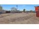 Large lot with gravel surface and a windmill at 5820 E Morning Vista Ln, Cave Creek, AZ 85331