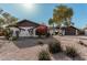 Charming single story home with landscaped front yard and large driveway at 6409 W Orange Dr, Glendale, AZ 85301