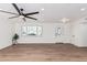 Spacious living room with hardwood floors and ceiling fan at 6409 W Orange Dr, Glendale, AZ 85301