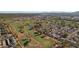 Aerial view of a residential area near a golf course at 725 E Vaughn Dr, Tempe, AZ 85283