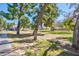 Landscaped community green space with mature trees at 725 E Vaughn Dr, Tempe, AZ 85283