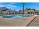 Inviting kidney-shaped community pool with lounge chairs at 725 E Vaughn Dr, Tempe, AZ 85283