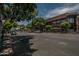 Street view of a city block with shops and trees at 725 E Vaughn Dr, Tempe, AZ 85283