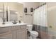 Well-lit bathroom with shower/tub combo and updated vanity at 7409 W Briles Rd, Peoria, AZ 85383