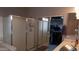 Bathroom features a shower, walk-in closet, and double vanity at 7409 W Briles Rd, Peoria, AZ 85383