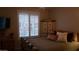 Cozy bedroom with window shutters and decorative cabinet at 7409 W Briles Rd, Peoria, AZ 85383