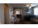 Open dining area with a view of the living room and stairs at 7409 W Briles Rd, Peoria, AZ 85383