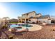 Two-story home with a large backyard, pool, and spa at 7409 W Briles Rd, Peoria, AZ 85383