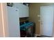 Laundry room with washer, dryer, and storage cabinets at 7409 W Briles Rd, Peoria, AZ 85383