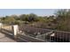 Patio view overlooking desert landscape, mountains, and homes at 7409 W Briles Rd, Peoria, AZ 85383