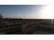 View from patio shows desert landscape and nearby homes at 7409 W Briles Rd, Peoria, AZ 85383