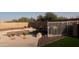 Stunning kidney shaped pool with a waterfall feature and a spacious patio at 7409 W Briles Rd, Peoria, AZ 85383