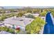 Aerial view of a home with tile roof, pool, and mountain views at 7462 E Visao Dr, Scottsdale, AZ 85266