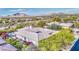 Aerial view showcasing the home's tile roof and surrounding landscape at 7462 E Visao Dr, Scottsdale, AZ 85266